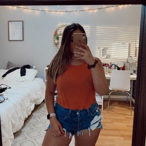 Flowy orange tank top with open back